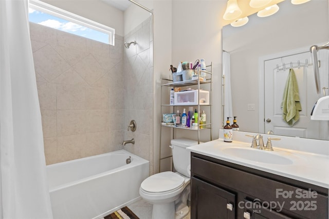 bathroom featuring vanity, shower / bath combo with shower curtain, and toilet