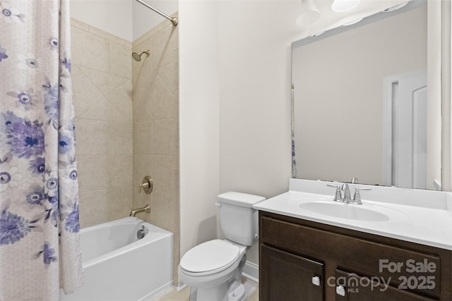 bathroom featuring shower / bath combination with curtain, vanity, and toilet