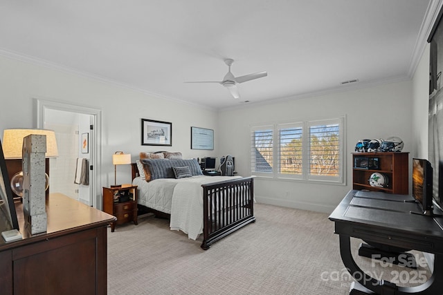 bedroom with crown molding, light colored carpet, visible vents, ceiling fan, and baseboards