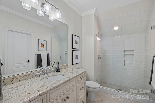 full bathroom with a shower stall, ornamental molding, and vanity