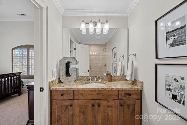 bathroom featuring vanity, visible vents, tiled shower, ensuite bath, and crown molding