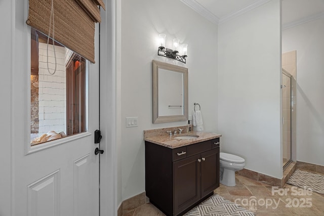 bathroom with crown molding, toilet, stone finish flooring, a shower stall, and vanity