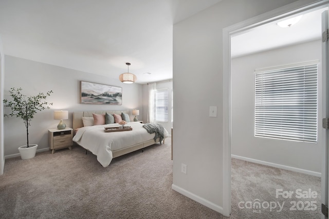 bedroom with light carpet