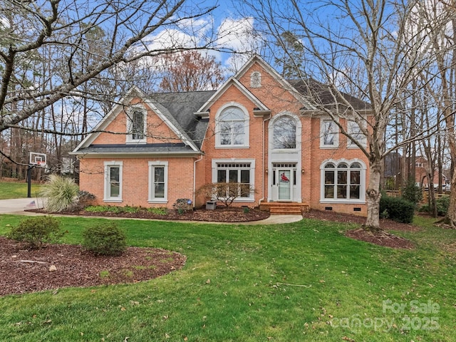 view of front of home with a front yard