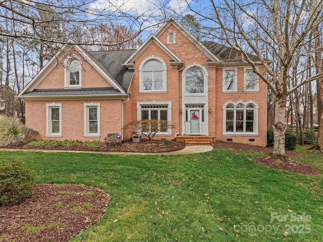 view of front of home with a front yard