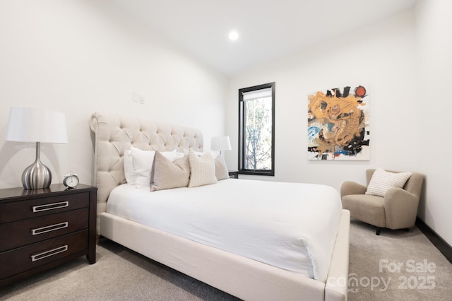 bedroom with recessed lighting, baseboards, vaulted ceiling, and light colored carpet