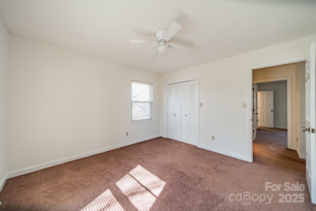 unfurnished bedroom with a ceiling fan, carpet, a closet, and baseboards