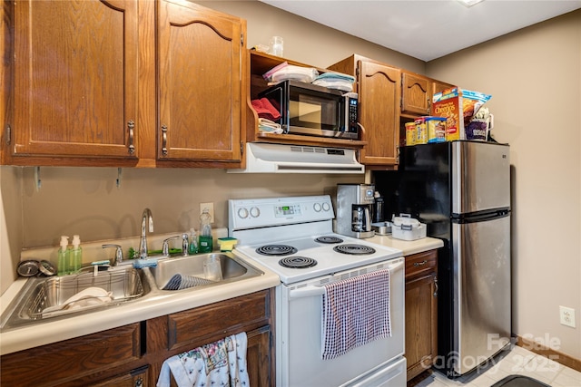 kitchen with sink and stainless steel appliances