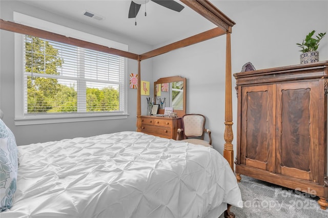 bedroom featuring a ceiling fan and visible vents