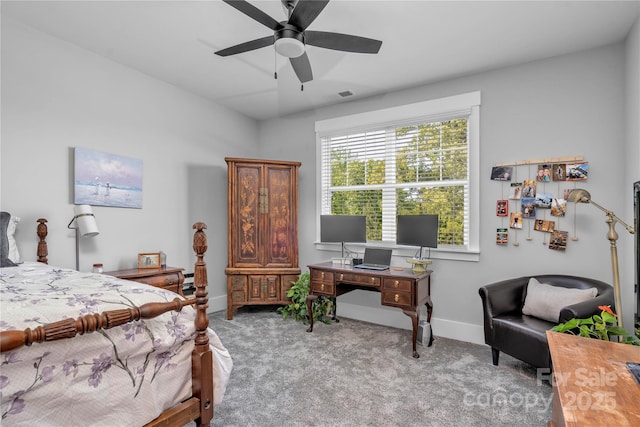 bedroom featuring a ceiling fan, light carpet, visible vents, and baseboards