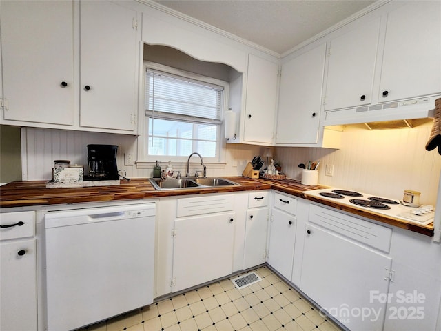 kitchen featuring wood counters, white dishwasher, sink, and white cabinets