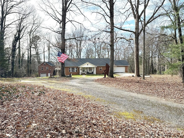 single story home featuring a garage