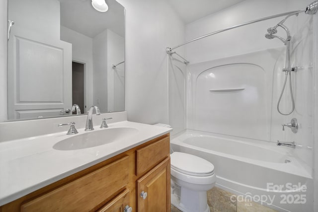 bathroom with bathing tub / shower combination, toilet, and vanity