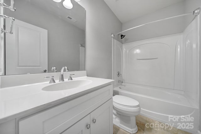 bathroom with shower / washtub combination, visible vents, toilet, vanity, and tile patterned flooring