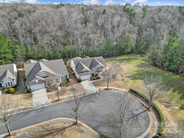 aerial view featuring a view of trees