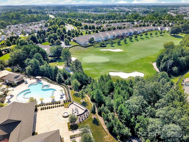 bird's eye view with view of golf course