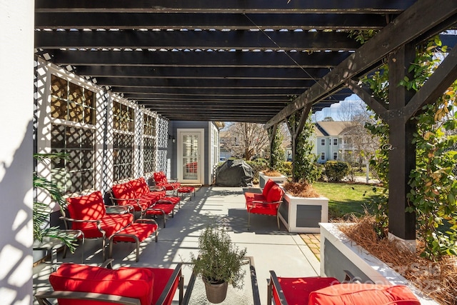 view of patio featuring a pergola