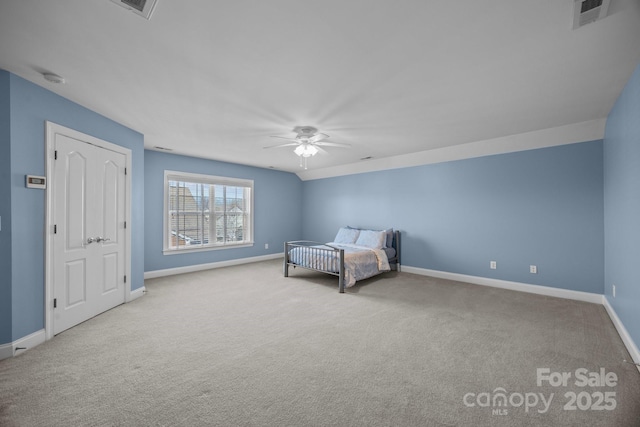 bedroom featuring light carpet, ceiling fan, visible vents, and baseboards