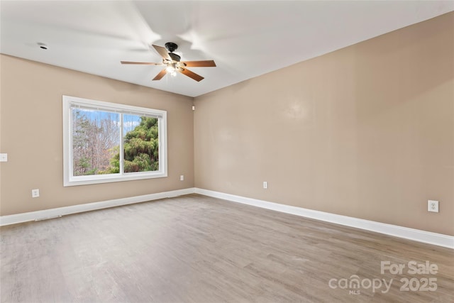 unfurnished room featuring wood-type flooring and ceiling fan