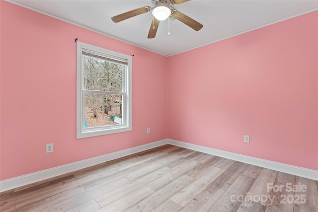 empty room featuring ceiling fan and light hardwood / wood-style floors