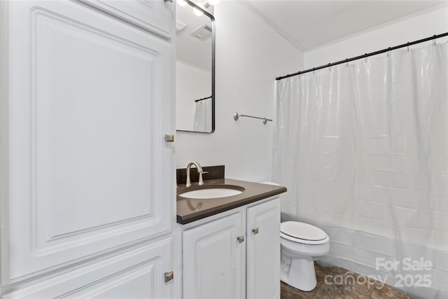 bathroom with vanity, a shower with curtain, and toilet