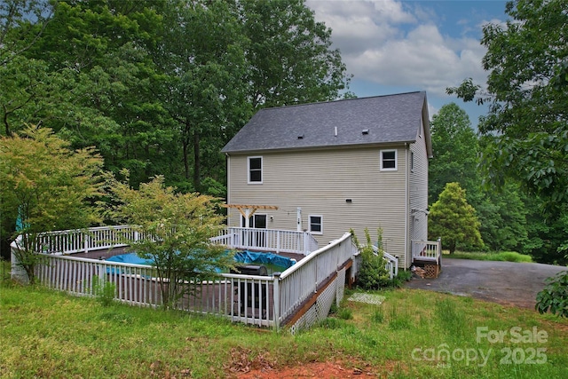 946 Laurelwood Dr, Clover, SC 29710 - rear view of property featuring a wooden deck and roof with shingles