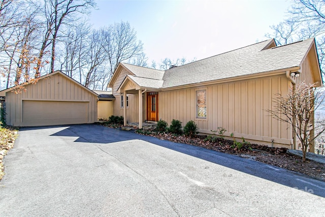 view of front of house with roof with shingles