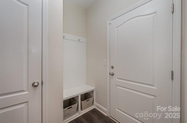 mudroom with dark hardwood / wood-style floors