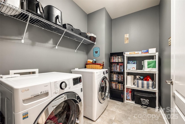 laundry room featuring laundry area and washing machine and dryer