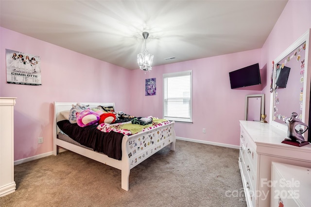 bedroom featuring light carpet, an inviting chandelier, baseboards, and visible vents