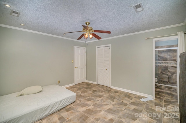 bedroom featuring ornamental molding, a closet, a textured ceiling, and ceiling fan