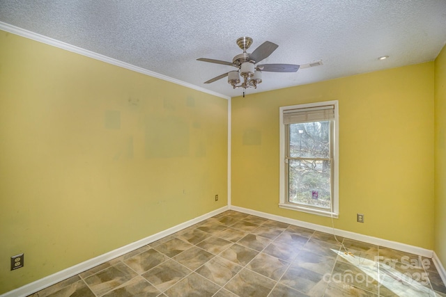 spare room featuring ceiling fan and a textured ceiling