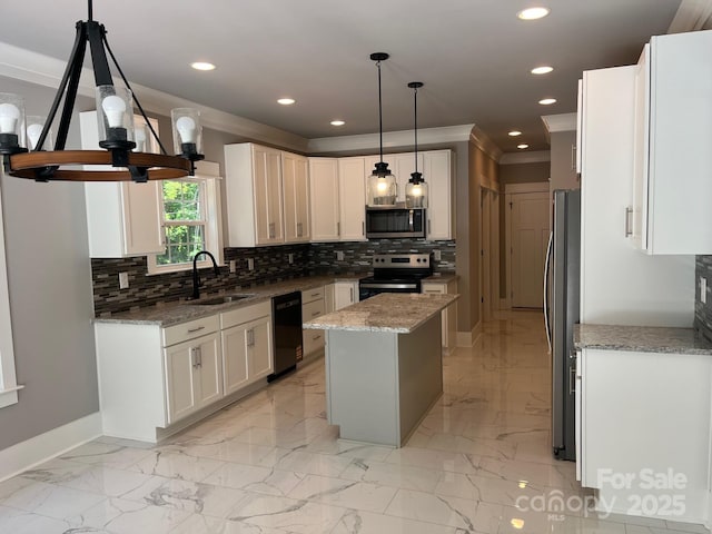 7221 Static Way Unit 13, Sherrills Ford, NC 28673 - kitchen featuring stainless steel appliances, a sink, ornamental molding, baseboards, and a kitchen island