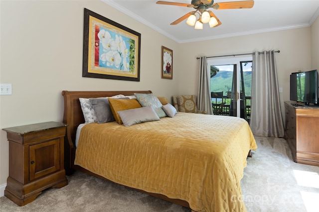 bedroom featuring ceiling fan, ornamental molding, light colored carpet, and access to exterior