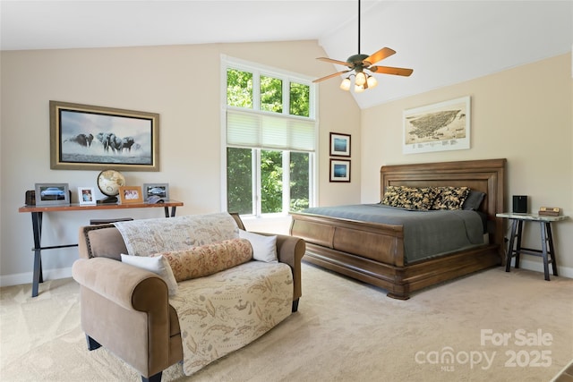 bedroom featuring light carpet, high vaulted ceiling, ceiling fan, and baseboards