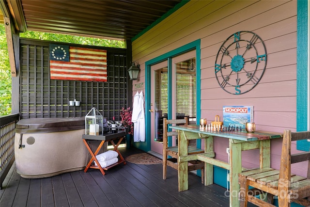 wooden terrace featuring exterior bar