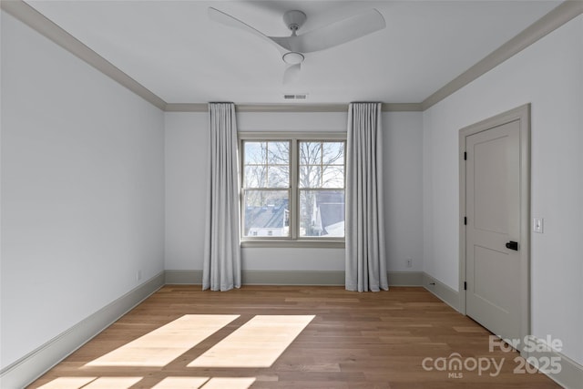 unfurnished room featuring wood-type flooring