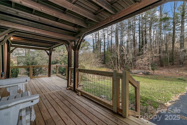 wooden deck with a yard