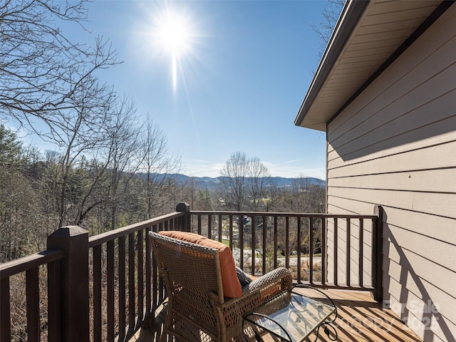 balcony featuring a mountain view