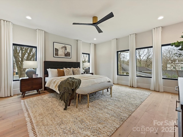 bedroom featuring recessed lighting, light wood-type flooring, and ceiling fan