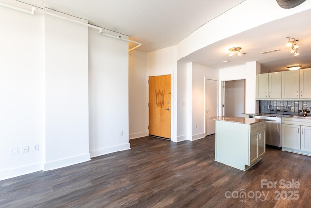 kitchen with backsplash, a center island, dark wood-type flooring, dishwasher, and a sink