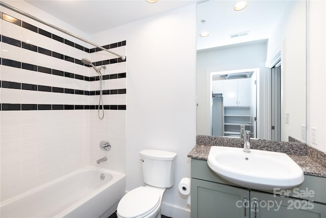 bathroom with visible vents, toilet, recessed lighting, bathing tub / shower combination, and vanity