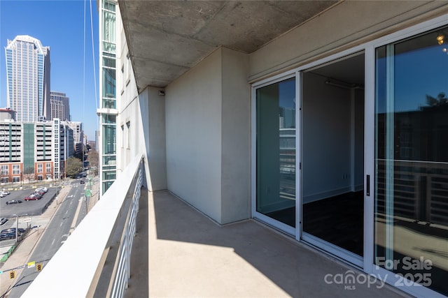 balcony featuring a city view