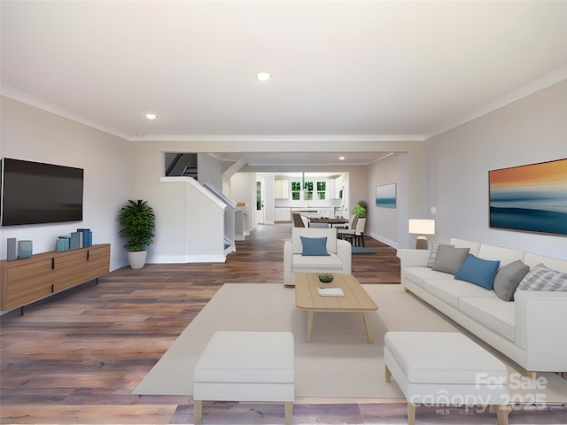 living room with hardwood / wood-style flooring and ornamental molding