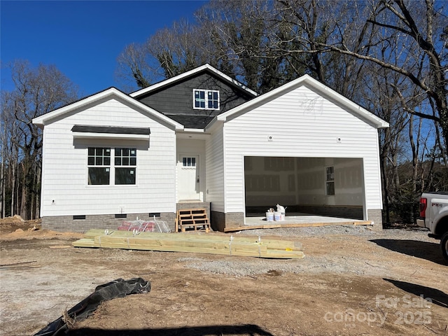 view of front of house with a garage