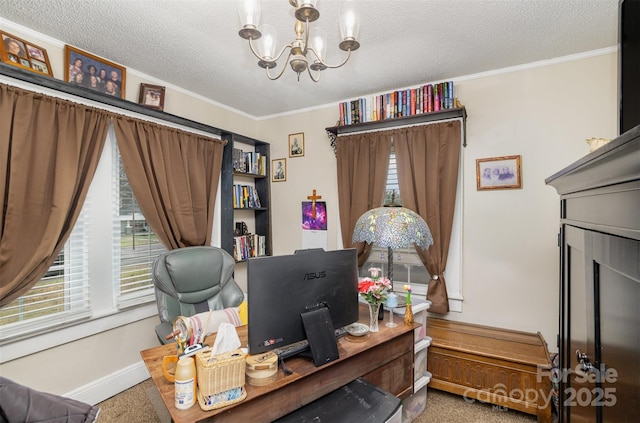 office space featuring ornamental molding, a healthy amount of sunlight, a notable chandelier, and a textured ceiling