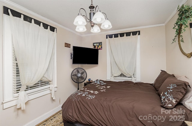 bedroom with ornamental molding and a notable chandelier