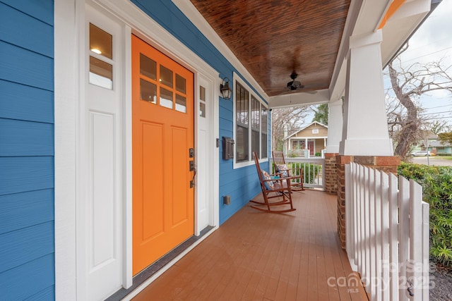 entrance to property featuring a porch