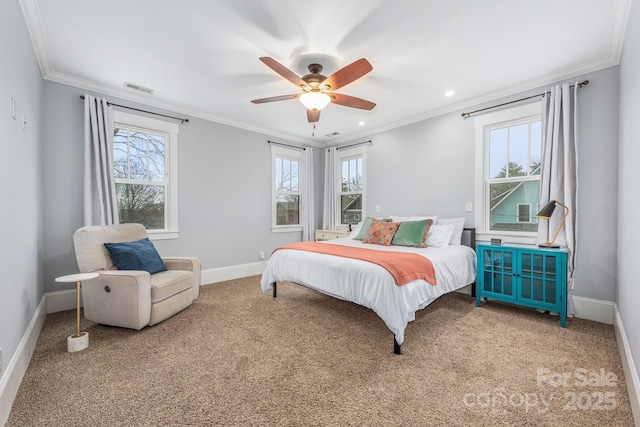 carpeted bedroom with crown molding and ceiling fan