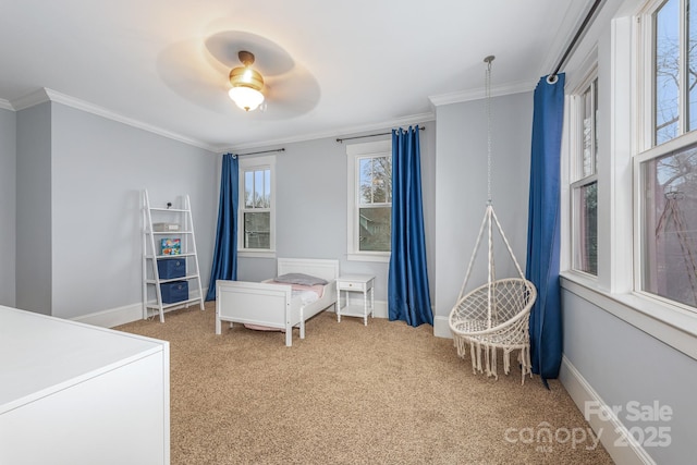 bedroom featuring ornamental molding, carpet, and ceiling fan